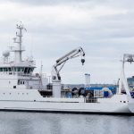 Special purpose vessel with mission-specific deck equipment at a quay, illustrating the range of research, survey and support craft in this class